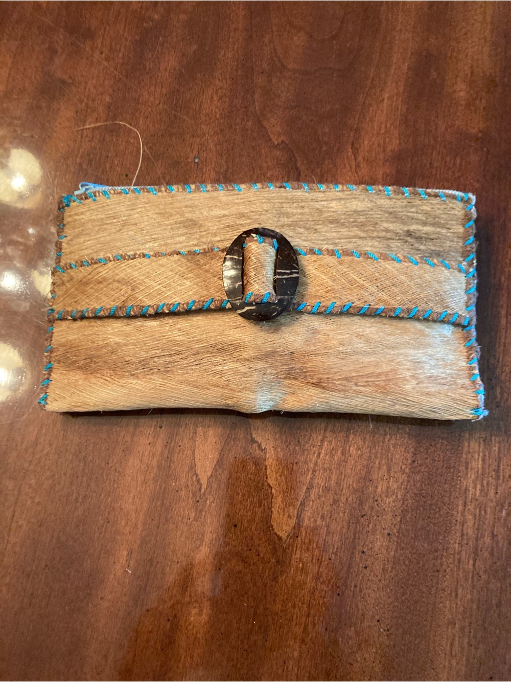 Handcrafted Natural Hair-On Hide Clutch with Turquoise Stitching